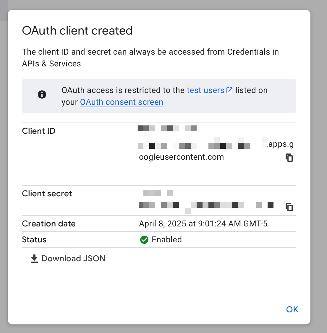 Success dialog showing OAuth client ID and client secret credentials created